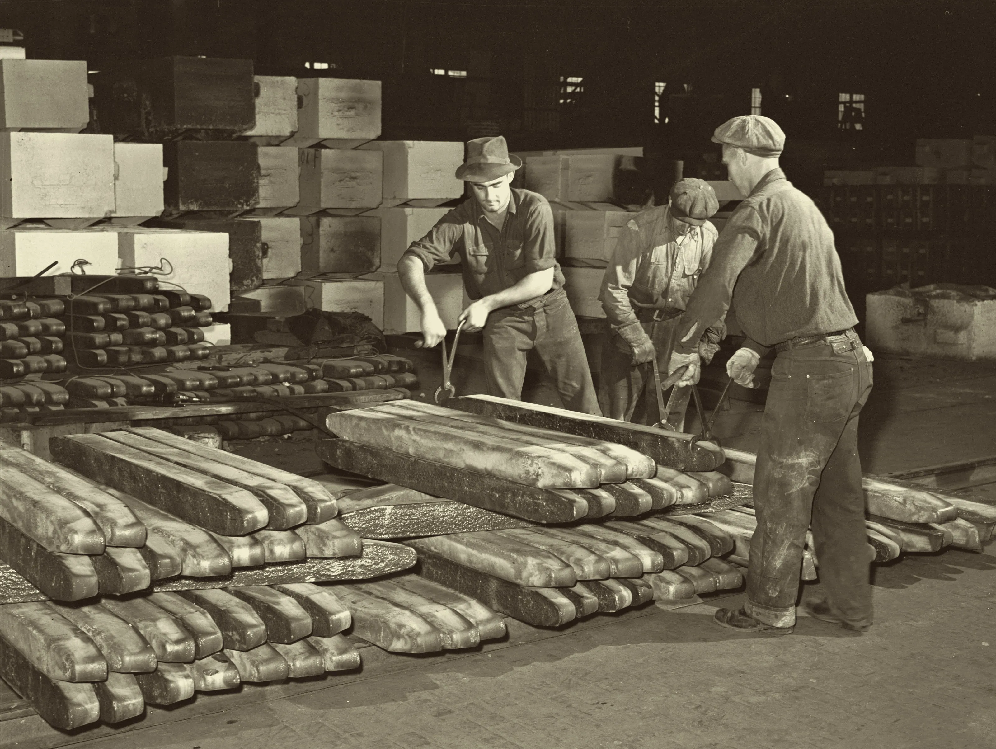 Cast copper wire bars at the Anaconda furnace refinery, Great Falls, Montana, 1942