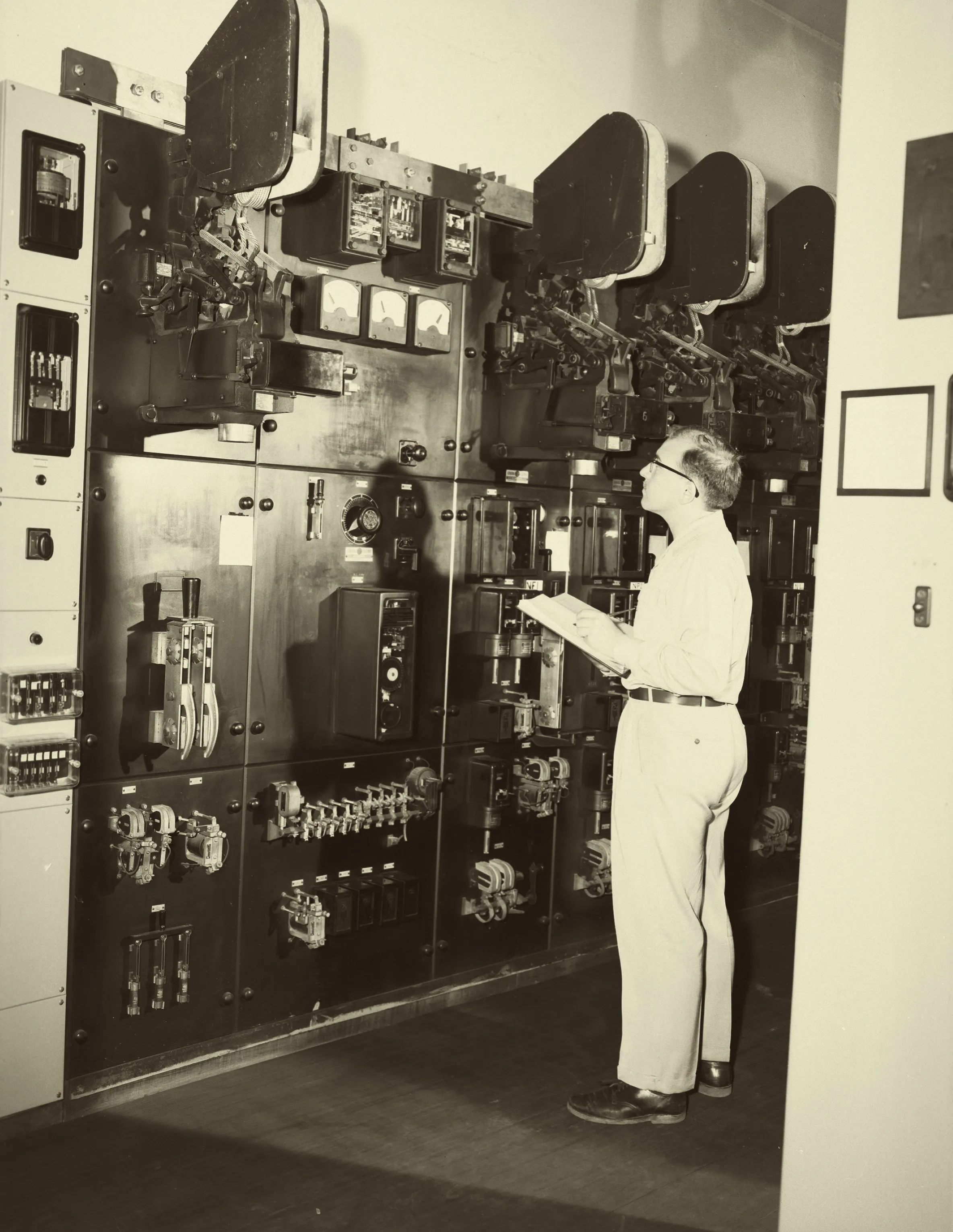 Worker at North Substation rectifier station, Seattle, 1954